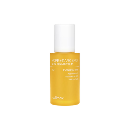 CELIMAX Pore + Dark Spot Brightening Serum is a lightweight serum designed to target uneven skin tone and visible pores. Powered by Niacinamide and Tranexamic Acid, it helps fade dark spots and brighten dull areas for a clearer complexion. Sodium Hyaluronate delivers hydration, while Bisabolol and botanical extracts soothe and calm the skin. With added Vitamin E, this serum nourishes and protects, leaving the skin smooth, refined, and radiant.