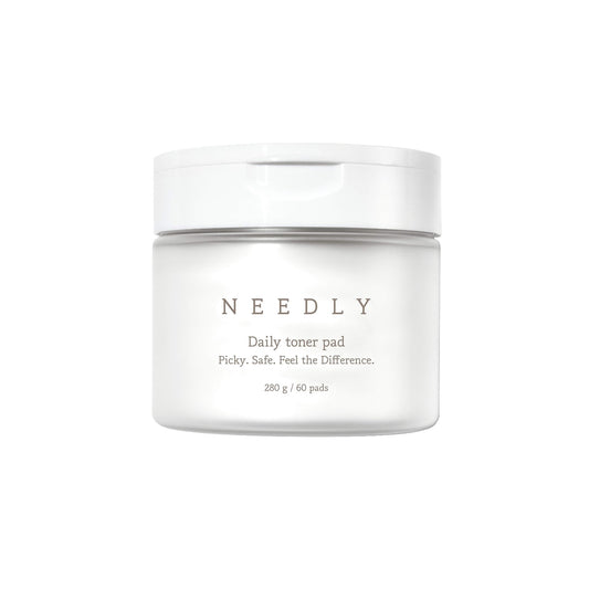 NEEDLY Daily Toner Pad gently exfoliates and hydrates the skin in one easy step. Infused with Centella Asiatica, Tea Tree Leaf Extract, and Salicylic Acid, it helps calm irritation, control excess oil, and refine pores. Each pad is soaked in a soothing essence with Glycerin and Sodium Hyaluronate to leave skin refreshed, smooth, and balanced—perfect for daily use on sensitive or troubled skin.
