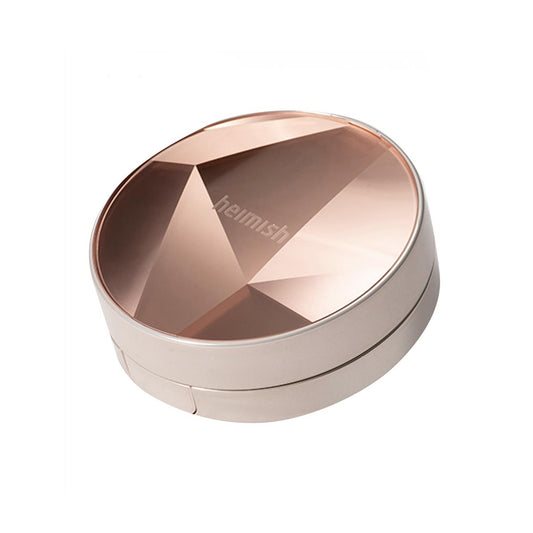 HEIMISH Artless Perfect Cushion + Refill is a lightweight cushion foundation that provides seamless coverage and a natural, radiant finish. Enriched with Niacinamide, it brightens and evens out skin tone, while Rosa Canina Fruit Extract and Thyme Leaf Extract nourish and soothe the skin. The formula blends effortlessly, delivering a smooth, dewy complexion that feels comfortable all day. Convenient and portable, this cushion compact is perfect for on-the-go touch-ups, keeping your skin looking fresh and fla