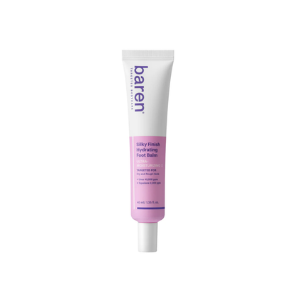 BAREN Silky Finish Hydrating Foot Balm is a rich yet fast-absorbing foot treatment designed to deeply moisturize and smooth dry, rough skin. Formulated with Urea, Glycerin, and Squalane, it helps soften hardened areas while restoring moisture balance. Shea Butter, Ceramides, and Cholesterol support the skin barrier, while Centella Asiatica Extract and Panthenol help calm and comfort tired feet. Multiple forms of Hyaluronic Acid deliver long-lasting hydration, leaving feet feeling soft, nourished, and silky 