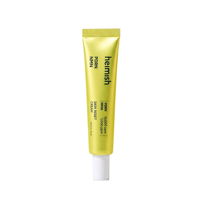 HEIMISH PDRN NMN Skin Reset Cream is a nourishing moisturizer designed to improve firmness, elasticity, and skin barrier strength. Formulated with PDRN (Sodium DNA), NMN, and eight types of Peptides, it helps support smoother, plumper, and more resilient-looking skin. Ceramide NP, Squalane, Beta-Glucan, and multiple forms of Hyaluronic Acid provide deep hydration and barrier support, while Niacinamide helps improve overall tone and radiance. The creamy texture absorbs comfortably without feeling sticky. Ide