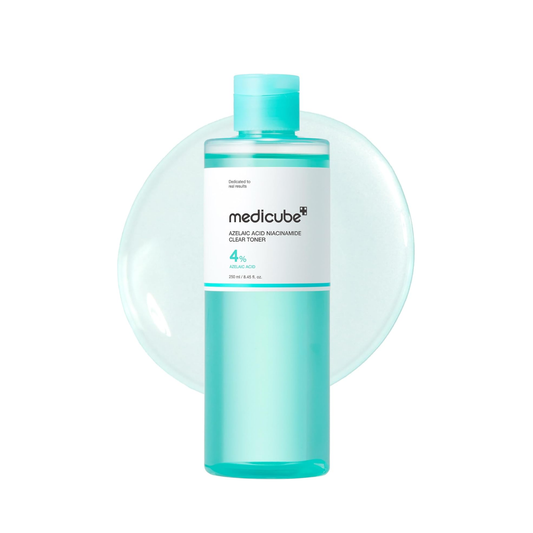 MEDICUBE Azelaic Acid Niacinamide Clear Toner is a gentle, balancing toner designed to help control excess oil while keeping skin calm and hydrated. Formulated with Azelaic Acid, it supports clearer-looking skin and helps improve the appearance of uneven skin tone. Niacinamide works to refine and balance the complexion, while ingredients like Hyaluronic Acid, Aloe Vera Leaf Extract, and Centella Asiatica provide soothing hydration. The lightweight, non-comedogenic formula refreshes the skin without clogging