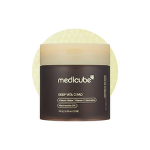 Load image into Gallery viewer, MEDICUBE Deep Vita C Pad is a radiance-boosting toner pad soaked in Vitamin C, Niacinamide, and Sea Buckthorn Water to brighten dull skin and improve overall tone. Infused with soothing plant extracts and Hyaluronic Acid, it gently exfoliates with PHA (Gluconolactone) while delivering deep hydration. Perfect for targeting dark spots, uneven texture, and tired-looking skin, leaving your complexion fresh, smooth, and glowing.