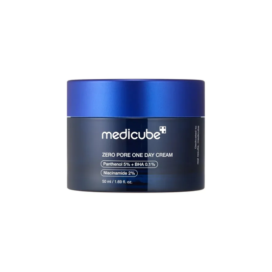 MEDICUBE Zero Pore One Day Cream is a lightweight, fast-absorbing cream designed to tighten pores and refine skin texture. Formulated with Panthenol, Niacinamide, and Salicylic Acid, it balances moisture and oil levels, reduces excess sebum, and provides hydration for a smooth, refreshed complexion.
