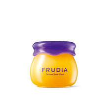 Load image into Gallery viewer, FRUDIA&#39;s Blueberry Hydrating Honey Lip Balm delivers intense hydration and nourishment to dry, chapped lips. Infused with a powerful blend of natural oils including Grape Seed, Mango Seed, and Apricot Kernel, alongside Hydrolyzed Collagen and Honey Extract, this balm ensures your lips stay soft, smooth, and moisturized. Rich in antioxidants from Blueberry Fruit Extract and fortified with Hyaluronic Acid, it helps to lock in moisture, providing long-lasting comfort and a subtle shine. Ideal for daily use, th