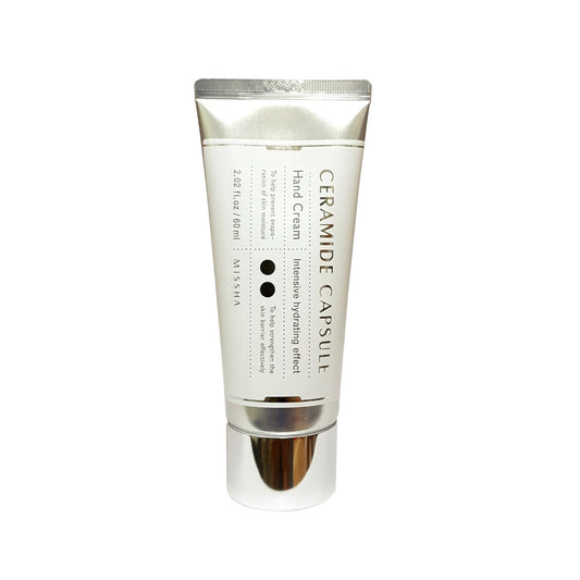 MISSHA Ceramide Capsule Hand Cream is a deeply hydrating and nourishing hand cream infused with Ceramide NP and Hydroxypropyl Bispalmitamide MEA to strengthen the skin barrier and lock in moisture. Enriched with Cocoa Seed Butter and Avocado Oil, it delivers a silky, non-greasy finish while softening and soothing dry hands. The lightweight formula absorbs quickly, leaving hands feeling smooth, protected, and delicately scented. Perfect for daily use to keep your hands moisturized and pampered.
