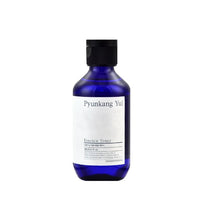 Load image into Gallery viewer, PYUNKANG YUL Essence Toner is a hydrating and nourishing toner primarily formulated with Astragalus Membranaceus Root Extract, known for its antioxidant and soothing properties. This essence-like toner is designed to deeply moisturize the skin, leaving it soft and supple. Its gentle formula includes Butylene Glycol for additional hydration and Arginine to help improve skin texture. Perfect for those seeking a minimalist yet effective skincare routine, this toner hydrates and preps the skin for the next step