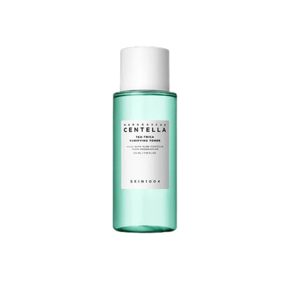 SKIN1004 Madagascar Centella Tea-Trica Purifying Toner is a refreshing and clarifying toner designed to soothe and balance the skin. It features 12% Tea Tree Leaf Water and 9.8% Centella Asiatica Extract to calm irritation and reduce redness while promoting a healthy skin barrier. Infused with Salicylic Acid, it gently exfoliates and helps unclog pores, making it ideal for acne-prone and sensitive skin. With added Lavender Extract and Castanea Crenata Shell Extract, it nourishes and refreshes, leaving your 